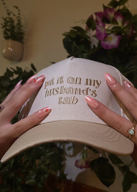 Beige "Put it on my husband's tab" Trucker Hat