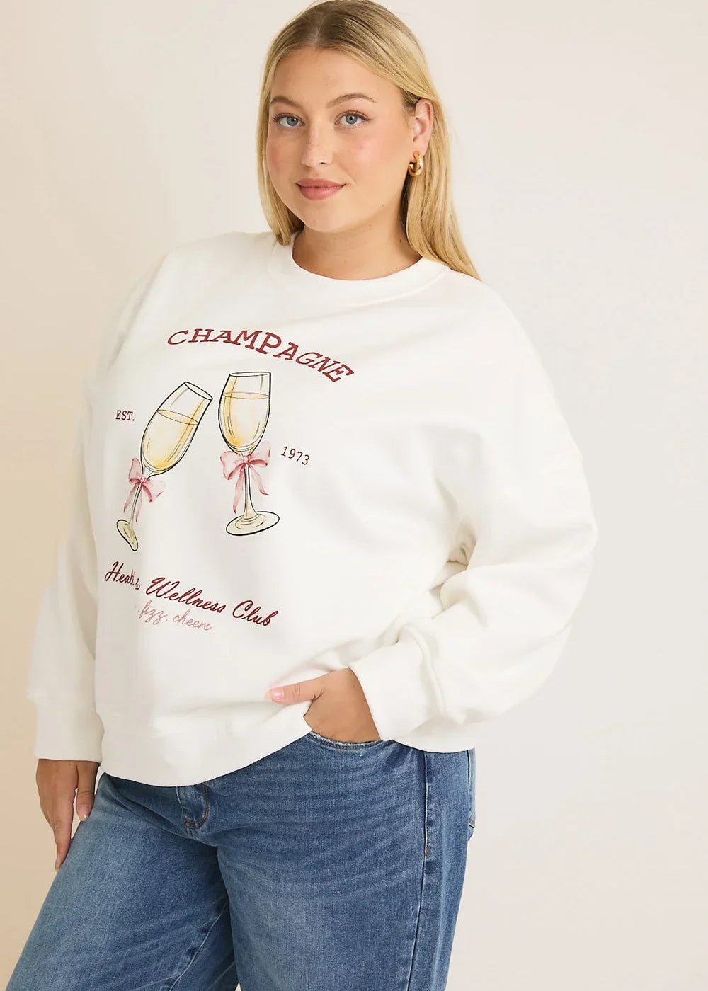 Plus Size Cream "Champagne Health Wellness Club" Graphic Long Sleeve Sweatshirt