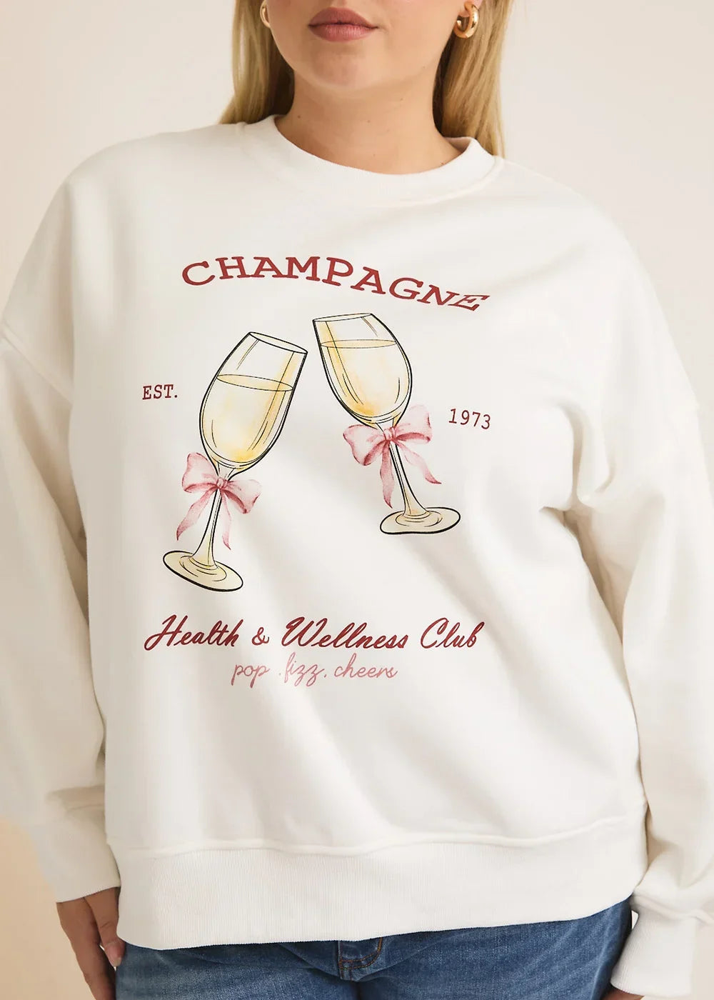 Plus Size Cream "Champagne Health Wellness Club" Graphic Long Sleeve Sweatshirt